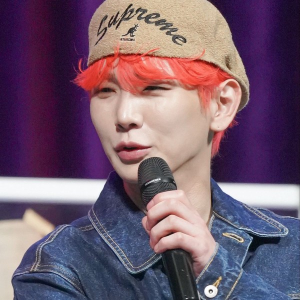 Signature photo of Key (SHINee) capturing their charm