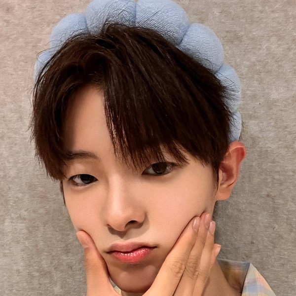 Signature photo of Kang Woojin capturing their charm