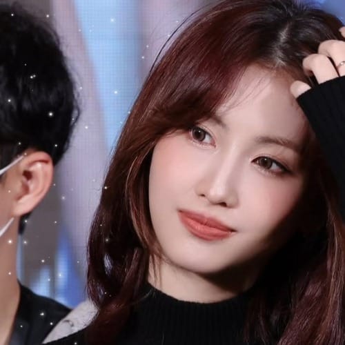 Signature photo of Momo (TWICE) capturing their charm