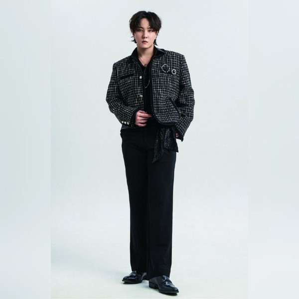 Signature photo of DK (iKON) capturing their charm