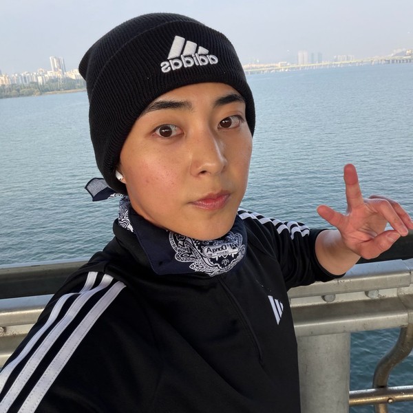 Signature photo of Xiumin (EXO) capturing their charm