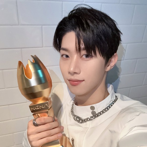 Signature photo of Hyunwoo (Xikers) capturing their charm