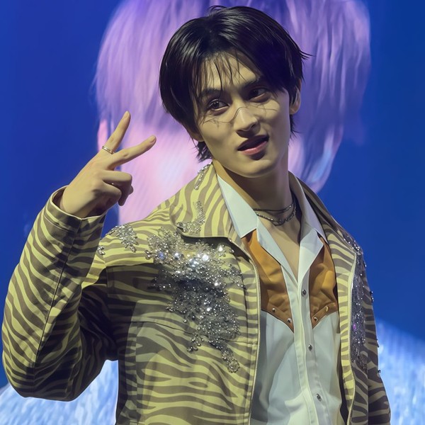 Signature photo of Mark (NCT 127, NCT DREAM) capturing their charm