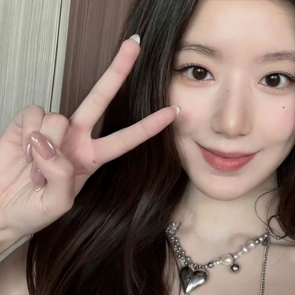 Signature photo of Shuhua (i-dle) capturing their charm