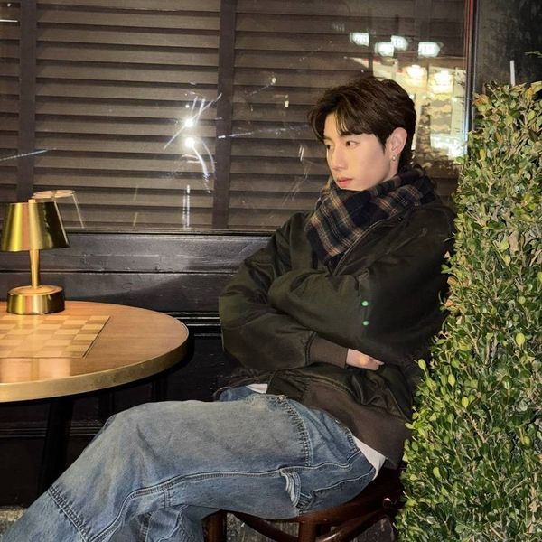 Signature photo of Mark (GOT7) capturing their charm