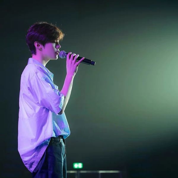 Signature photo of Kim Wooseok capturing their charm