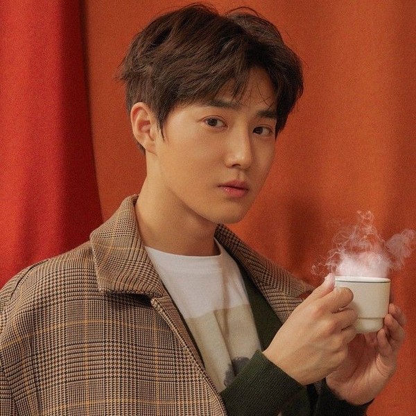 Signature photo of Suho (EXO) capturing their charm