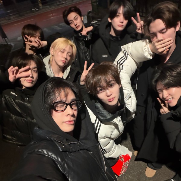 Signature photo of CRAVITY capturing their charm