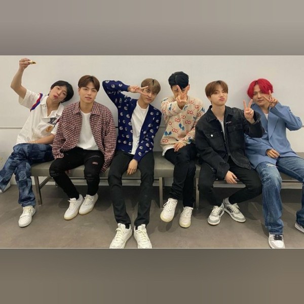 Signature photo of iKON capturing their charm