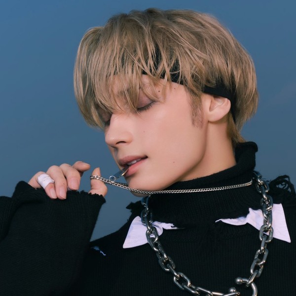 Signature photo of HueningKai (TOMORROW X TOGETHER) capturing their charm