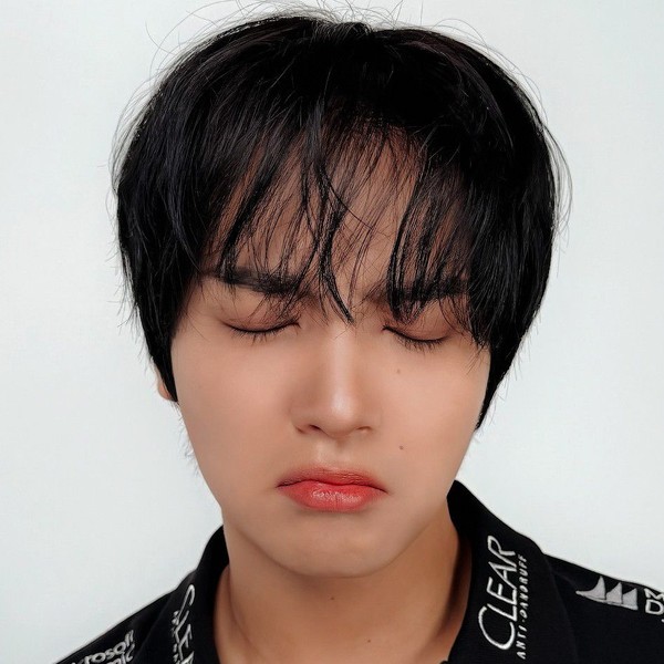 Signature photo of Haechan (NCT 127, NCT DREAM) capturing their charm