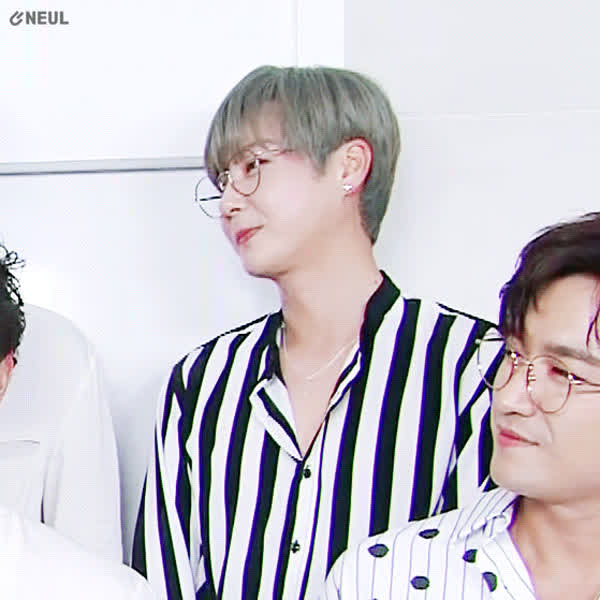 Signature photo of SHINHWA capturing their charm