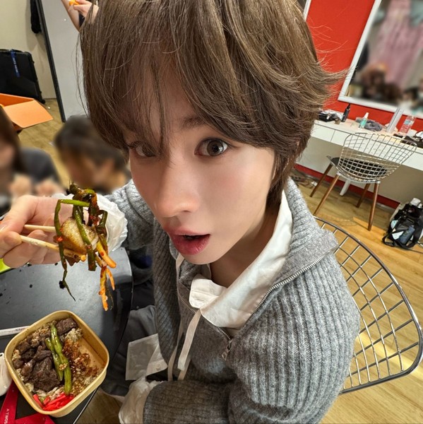 Signature photo of Kyungmin (TWS) capturing their charm