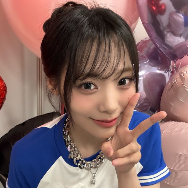 Signature photo of Siyeon (QWER) capturing their charm