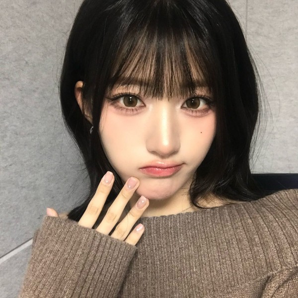 Signature photo of Junhwi (SAY MY NAME) capturing their charm