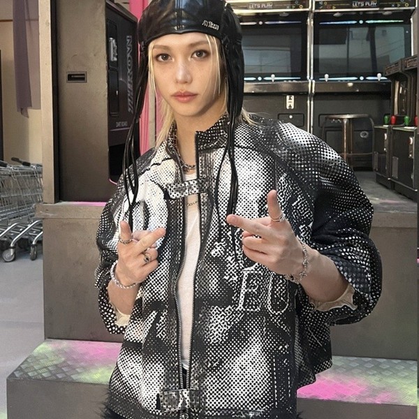 Signature photo of Felix (Stray Kids) capturing their charm