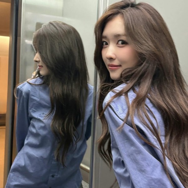 Signature photo of MiU (MADEIN) capturing their charm