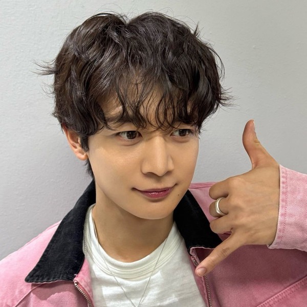 Signature photo of Minho (SHINee) capturing their charm