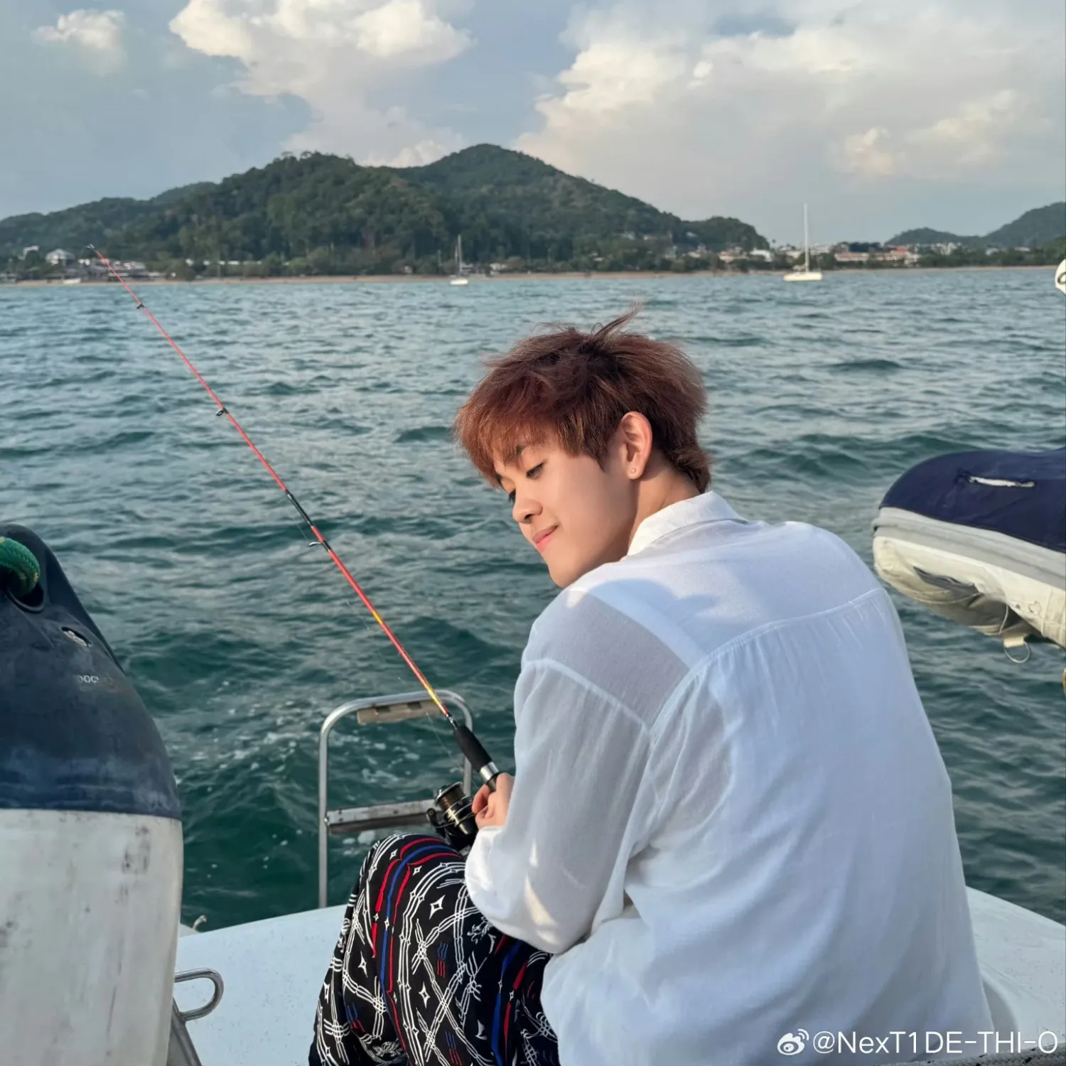 A moment captured by THI-O (NexT1DE)'s fan