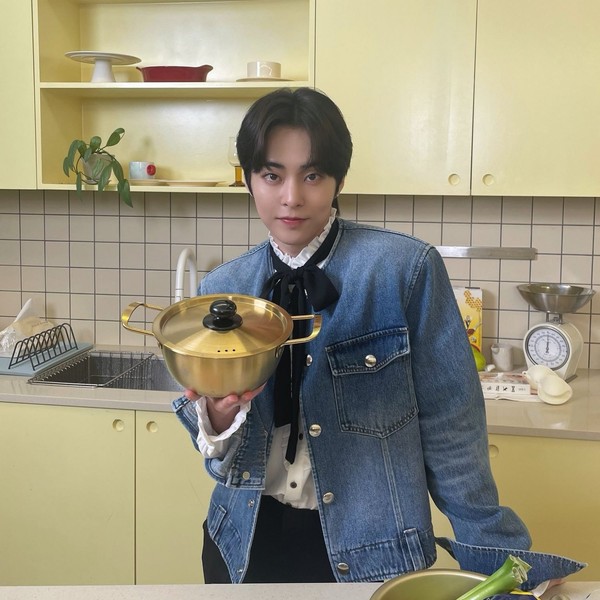 Signature photo of Xiumin (EXO) capturing their charm