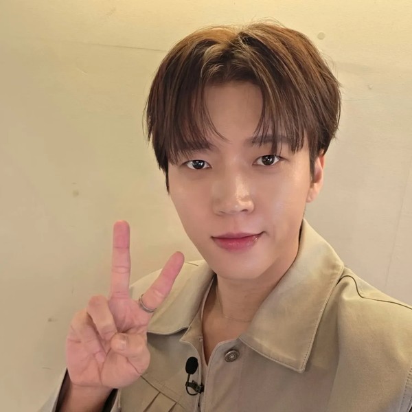 Signature photo of Woohyun (INFINITE) capturing their charm