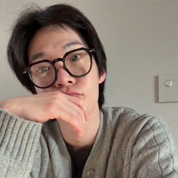 Signature photo of Doyoung (NCT 127) capturing their charm