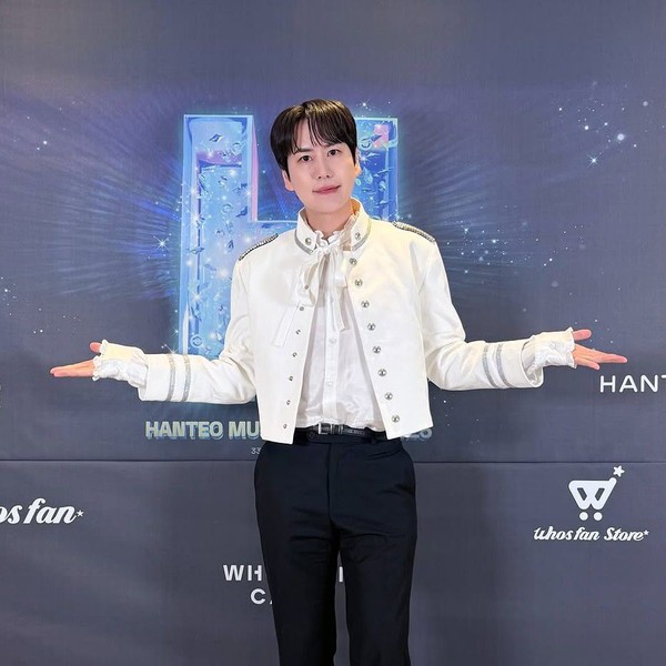 Signature photo of Kyuhyun (Super Junior) capturing their charm