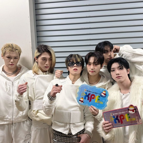 Signature photo of JUST B capturing their charm