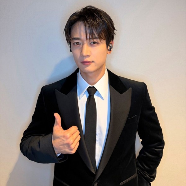 Signature photo of Minho (SHINee) capturing their charm