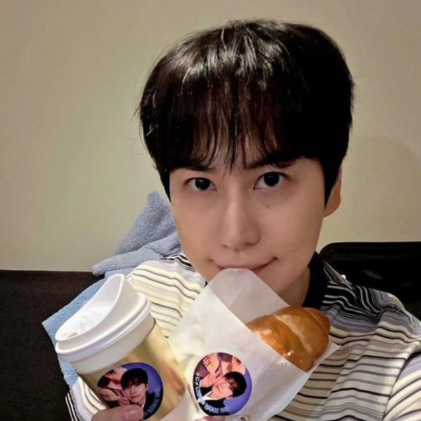 Signature photo of Kyuhyun (Super Junior) capturing their charm