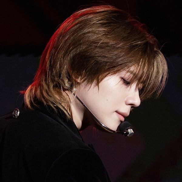 Signature photo of Taemin (SHINee) capturing their charm