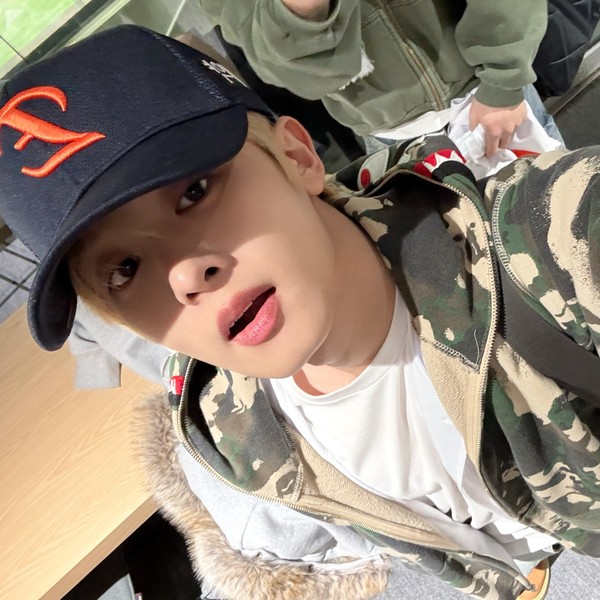 Signature photo of Woono (YOUNITE) capturing their charm