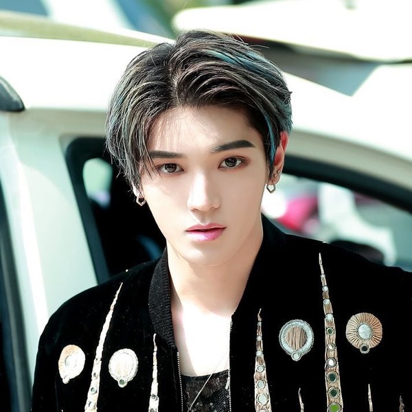 Signature photo of Taeyong (NCT 127) capturing their charm