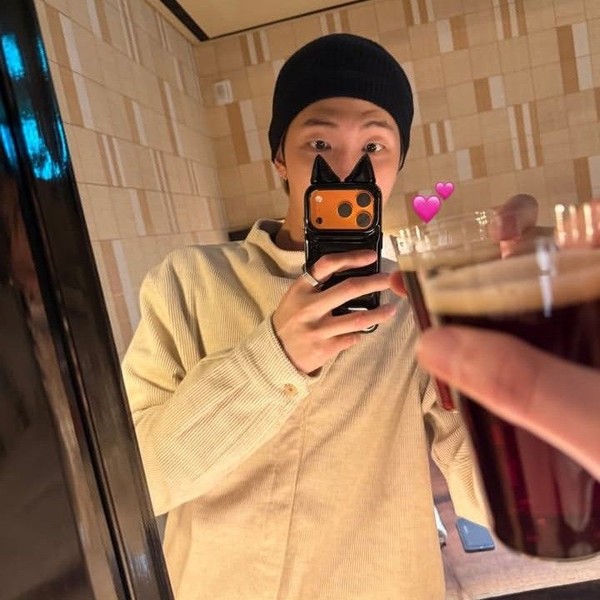 Signature photo of RM (BTS) capturing their charm