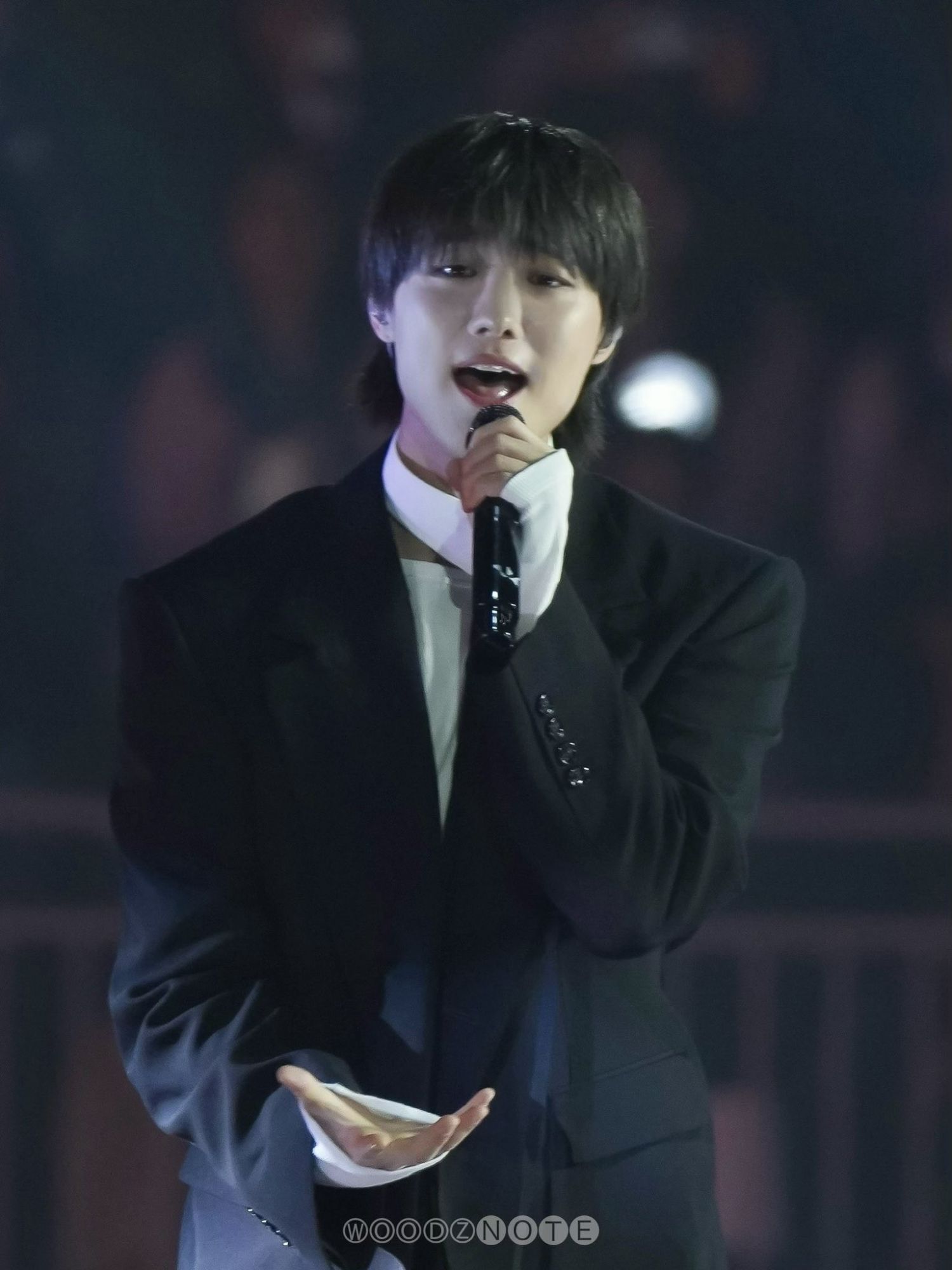 A moment captured by WOODZ's fan