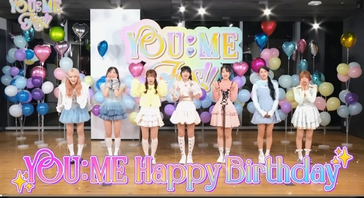 A moment captured by ME:I's fan