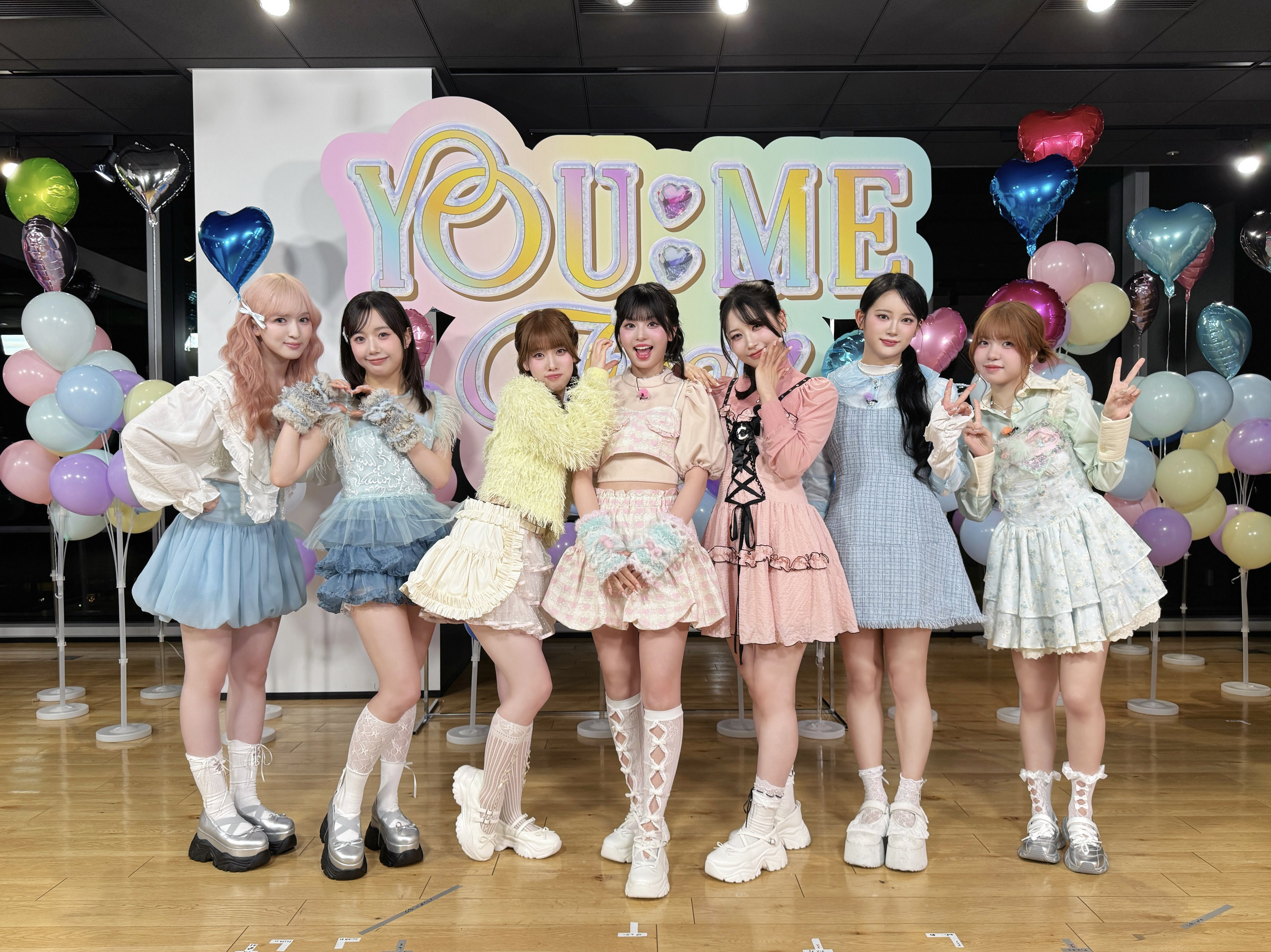 A moment captured by ME:I's fan